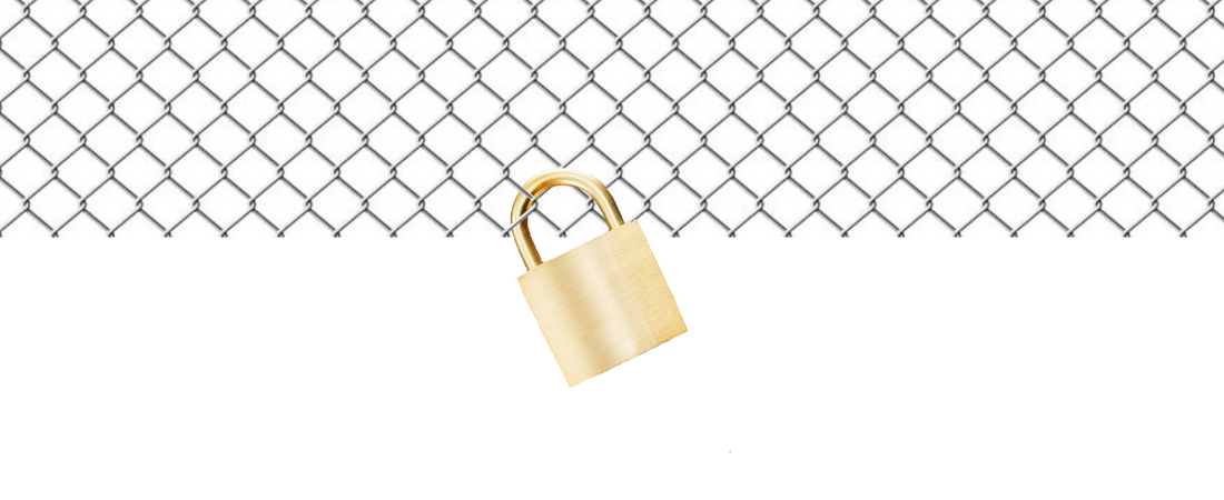 Chain link fence wire fabric with gold padlock attached